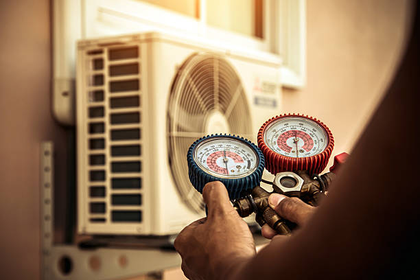 Professional Ductwork Repair technician working in London, AR